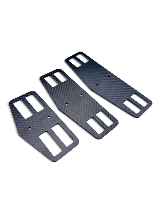 The three AeroGain BTA carbon fibre mount plates fanned side by side, three lengths